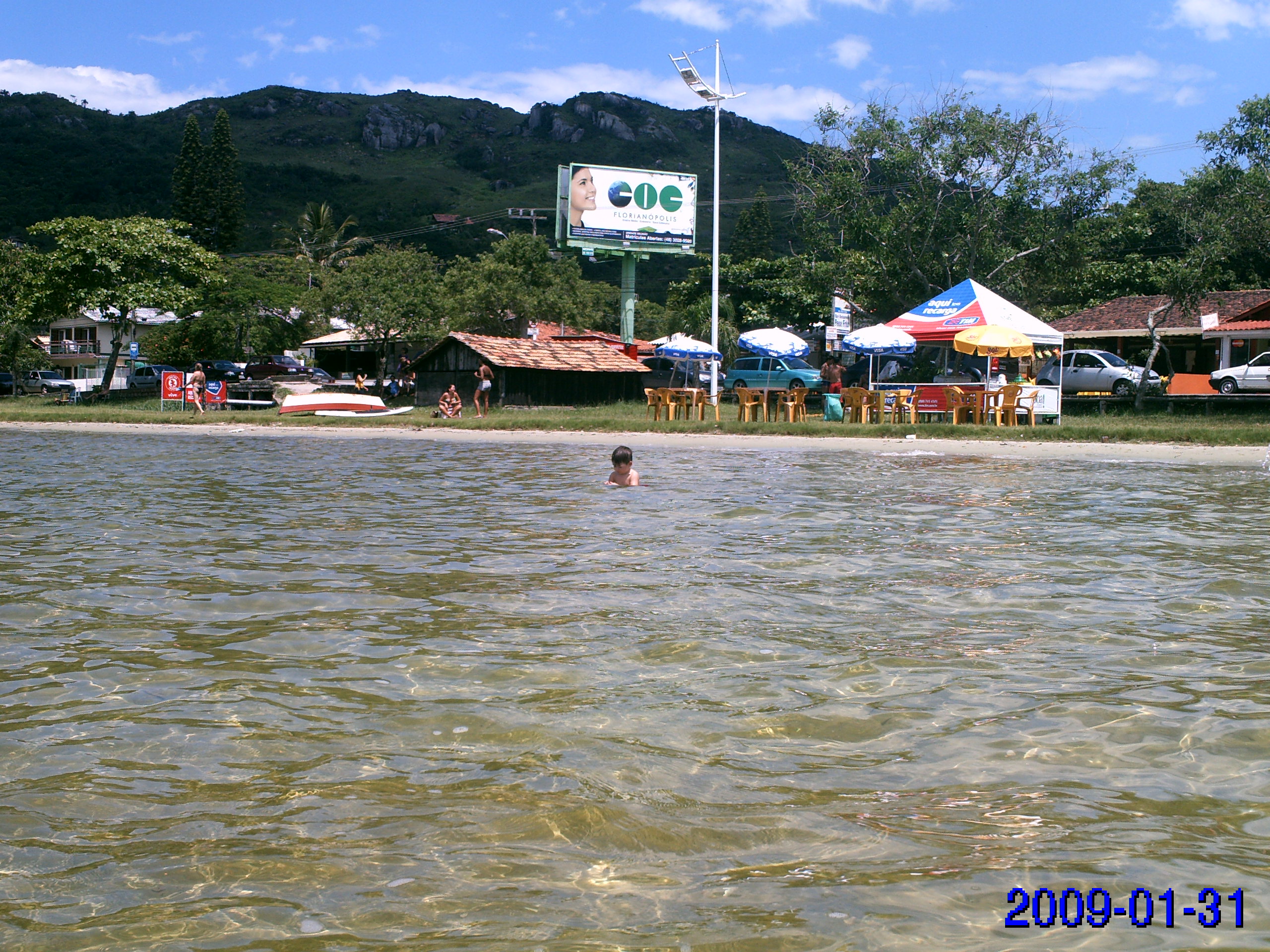 Blue water and green hills around Lagoa da Conceição in Florianópolis, Brazil