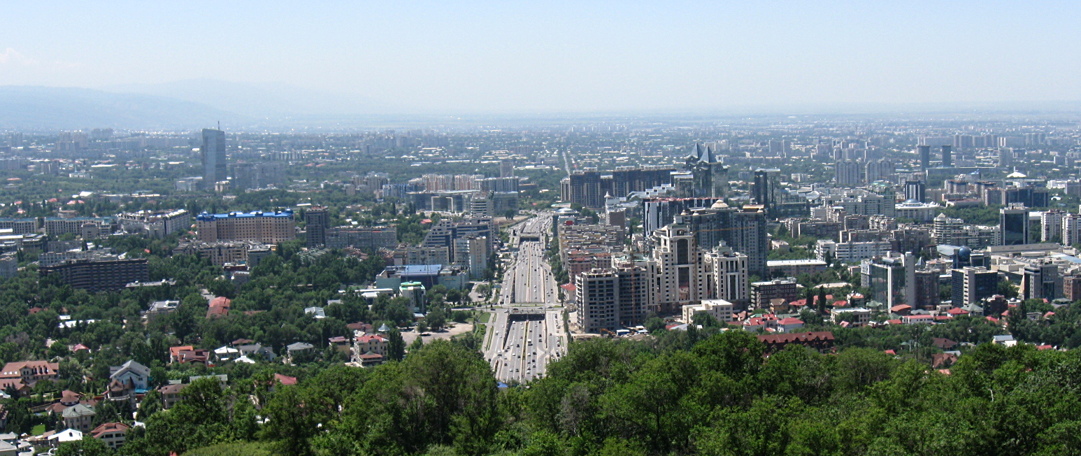 Panoramic view of Almaty with the city stretching toward the mountains
