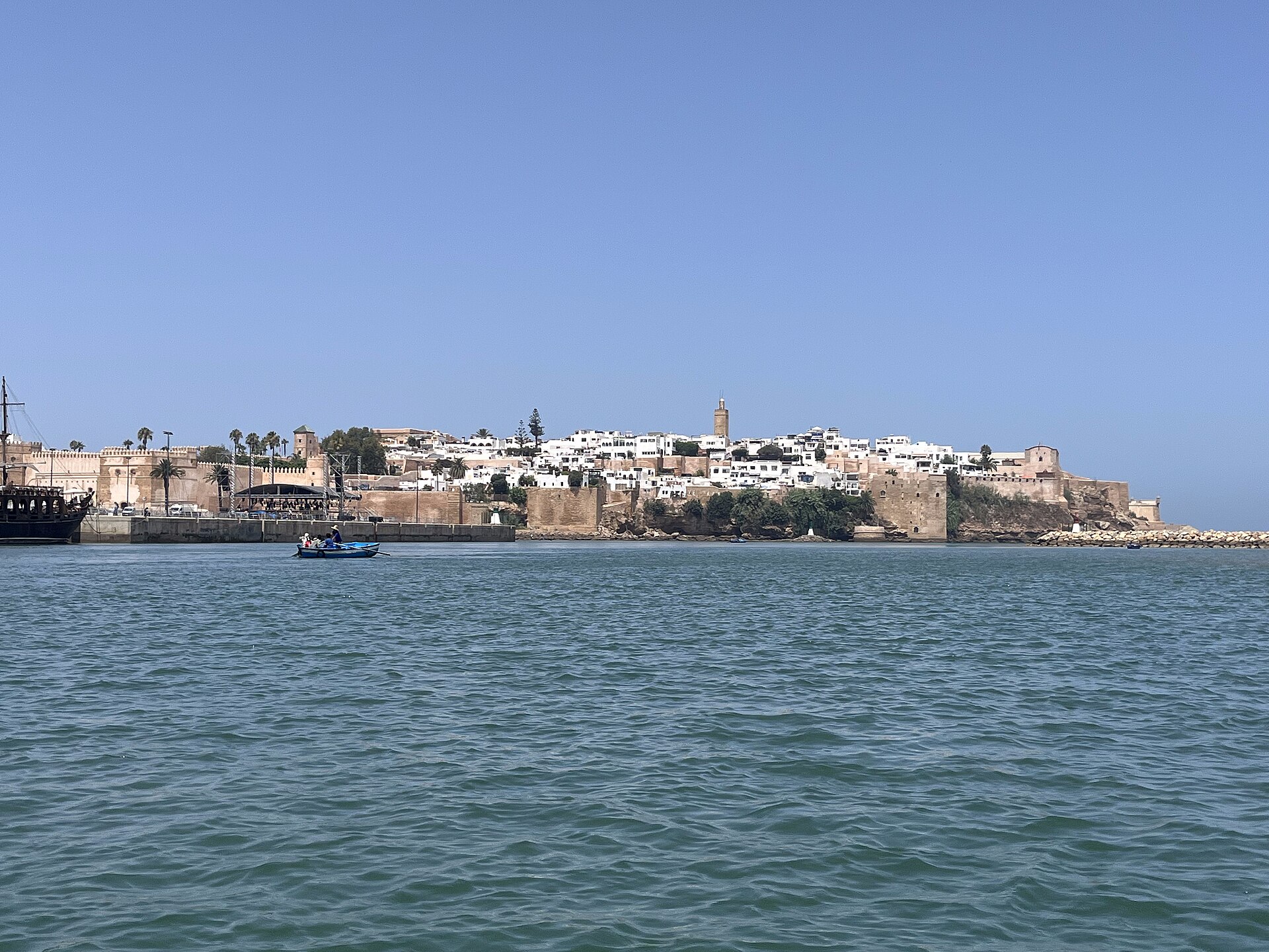 White buildings and fortified walls of Rabat’s Kasbah of the Oudayas above the Bouregreg waterfront.
